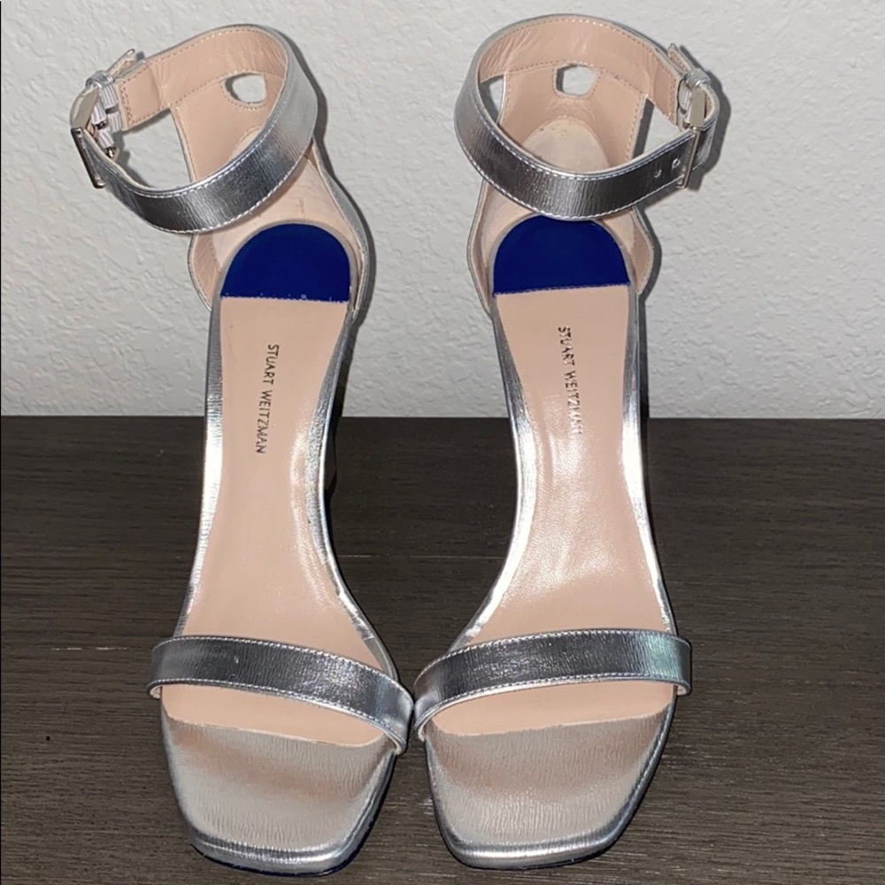 NWOT Stuart Weitzman silver heeled sandals.